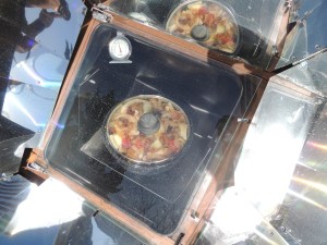 Preheat oven in the sun for an hour. Cook pot roast in the sun at over 250 for about 4-5 hours.