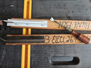 It took some work to remove the metal brackets from the trim. Then I measured and sawed, using my new circular saw. LOVE power tools!