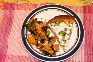 The butternut-kale dish is on the left. The white pizza with arugula and prosciutto is on the right.