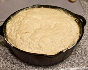 This is a loaf of sourdough bread, ready to cook on my gas BBQ grill. It is too hot to use the oven in the house.